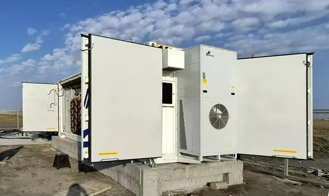 Outdoor equipment enclosure with access doors open