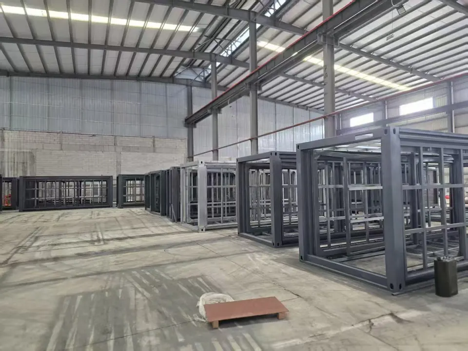 Expandable modular house steel frames arranged inside the production facility