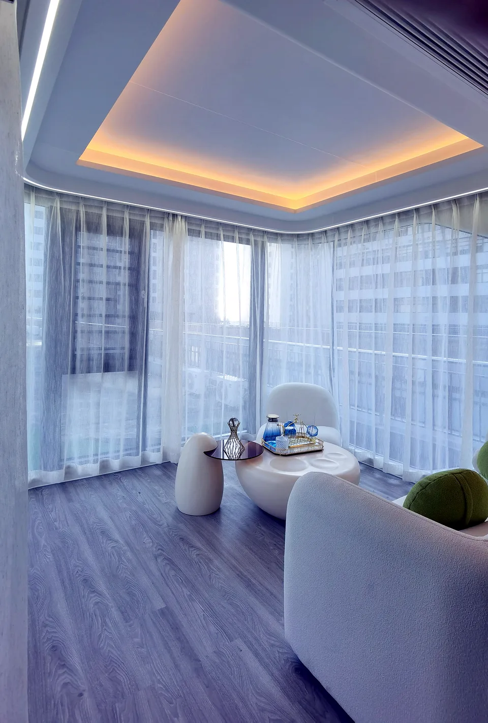 Finished space capsule interior with panoramic glazing, integrated lighting and lounge furniture